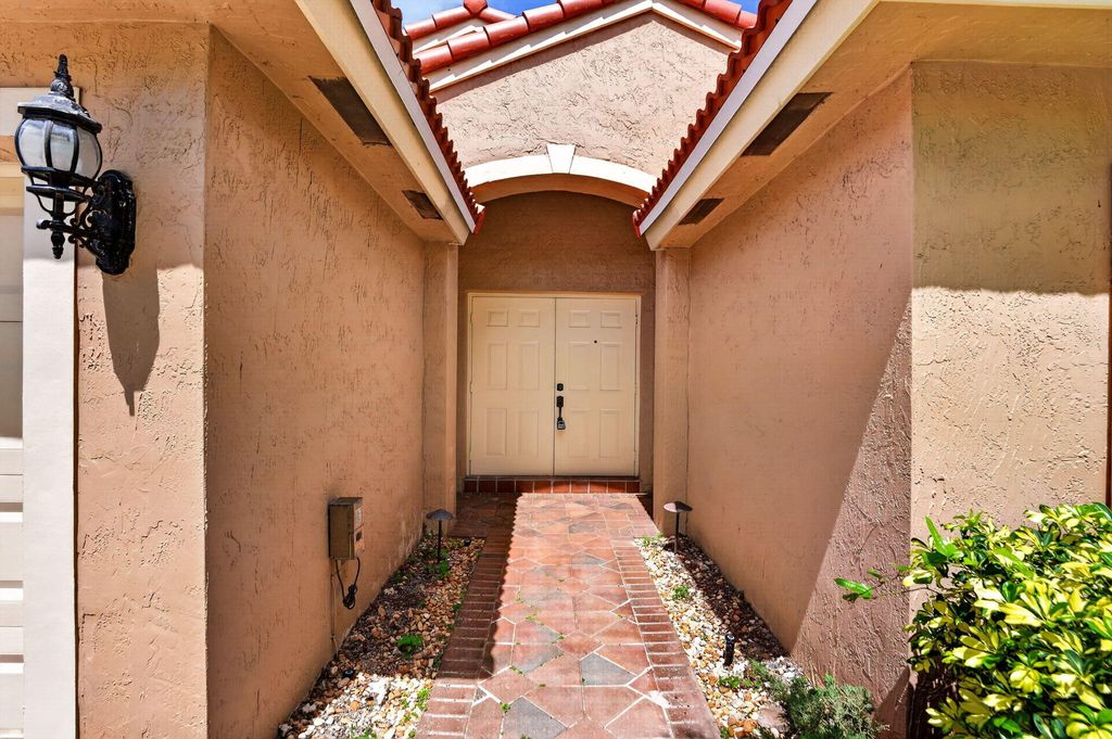 Photo of 4677 Saint Simon Drive, Coconut Creek, FL 33073 (MLS # B26015310)