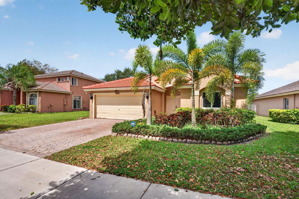 Photo of 4677 Saint Simon Drive, Coconut Creek, FL 33073 (MLS # B26015310)