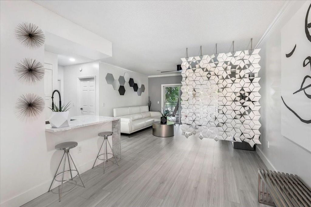 Photo of 2452 Centergate Drive #203, Miramar, FL 33025 (MLS # F10549213)