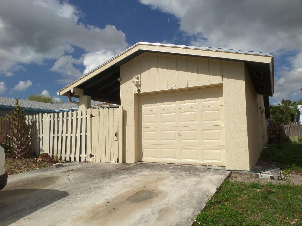 Photo of 8633 Pluto Terrace, West Palm Beach, FL 33403 (MLS # B26005490)