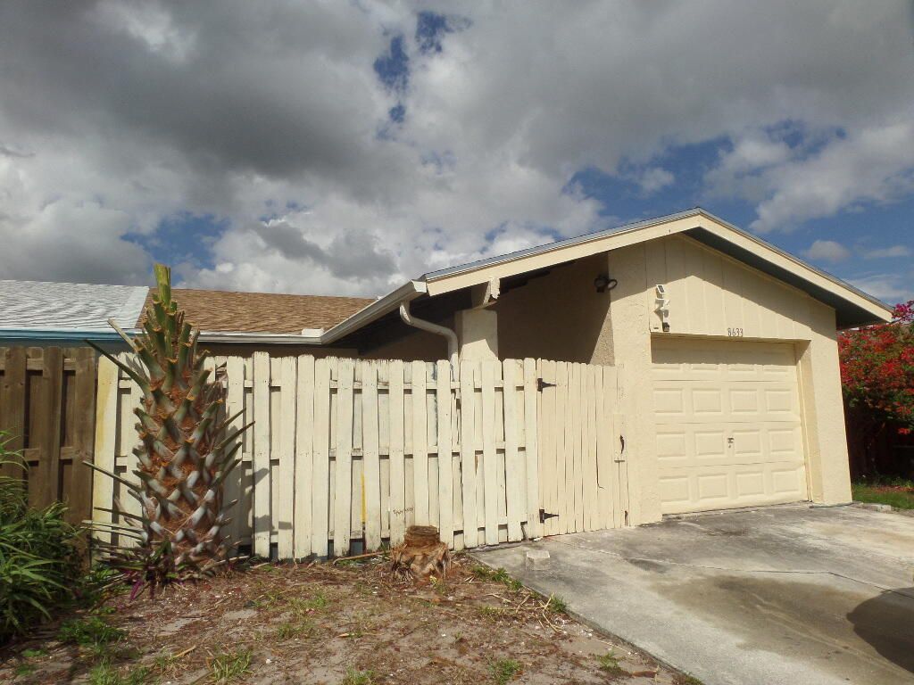 Photo of 8633 Pluto Terrace, West Palm Beach, FL 33403 (MLS # B26005490)