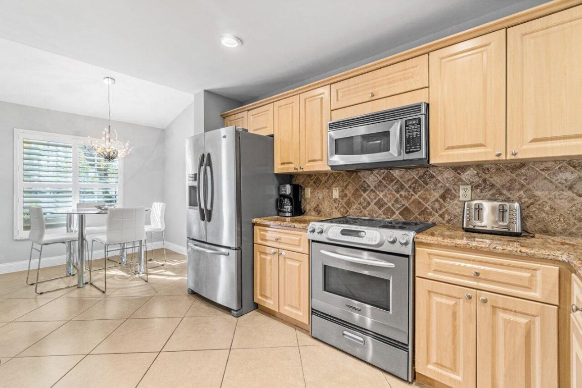 GREENS AT BOCA GOLF AND TENNIS CLUB - Residential