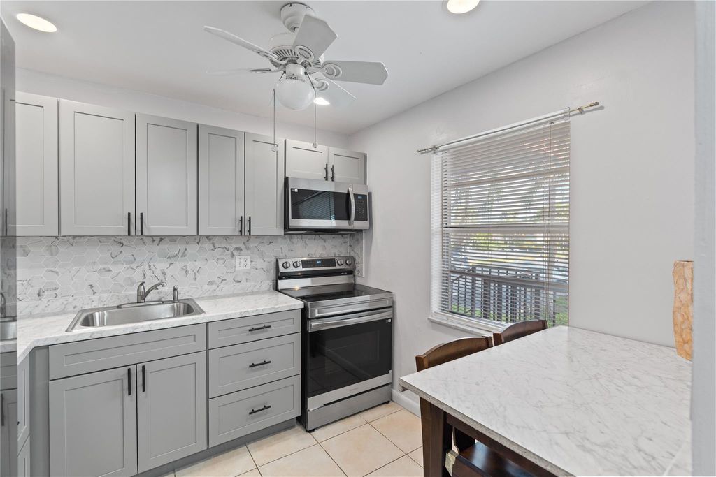 Photo of 1 Abbey Lane #201, Delray Beach, FL 33446 (MLS # F10556327)