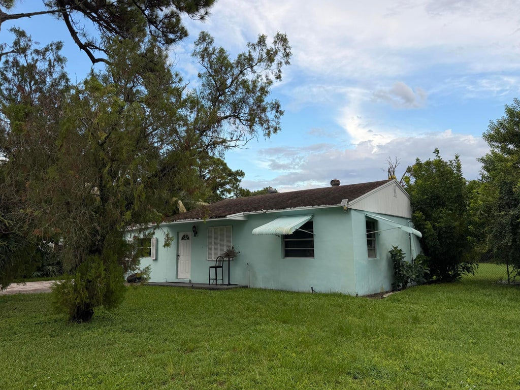 Photo of 3082 Reo Lane, Palm Springs, FL 33461 (MLS # B26073206)