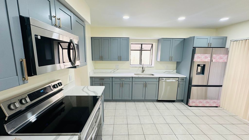 Photo of 6077 Strawberry Fields Way, Lake Worth, FL 33467 (MLS # B26001494)