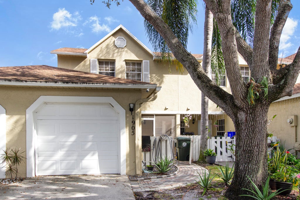 Photo of 1905 MAPLEWOOD Drive, Greenacres, FL 33415 (MLS # B26064474)