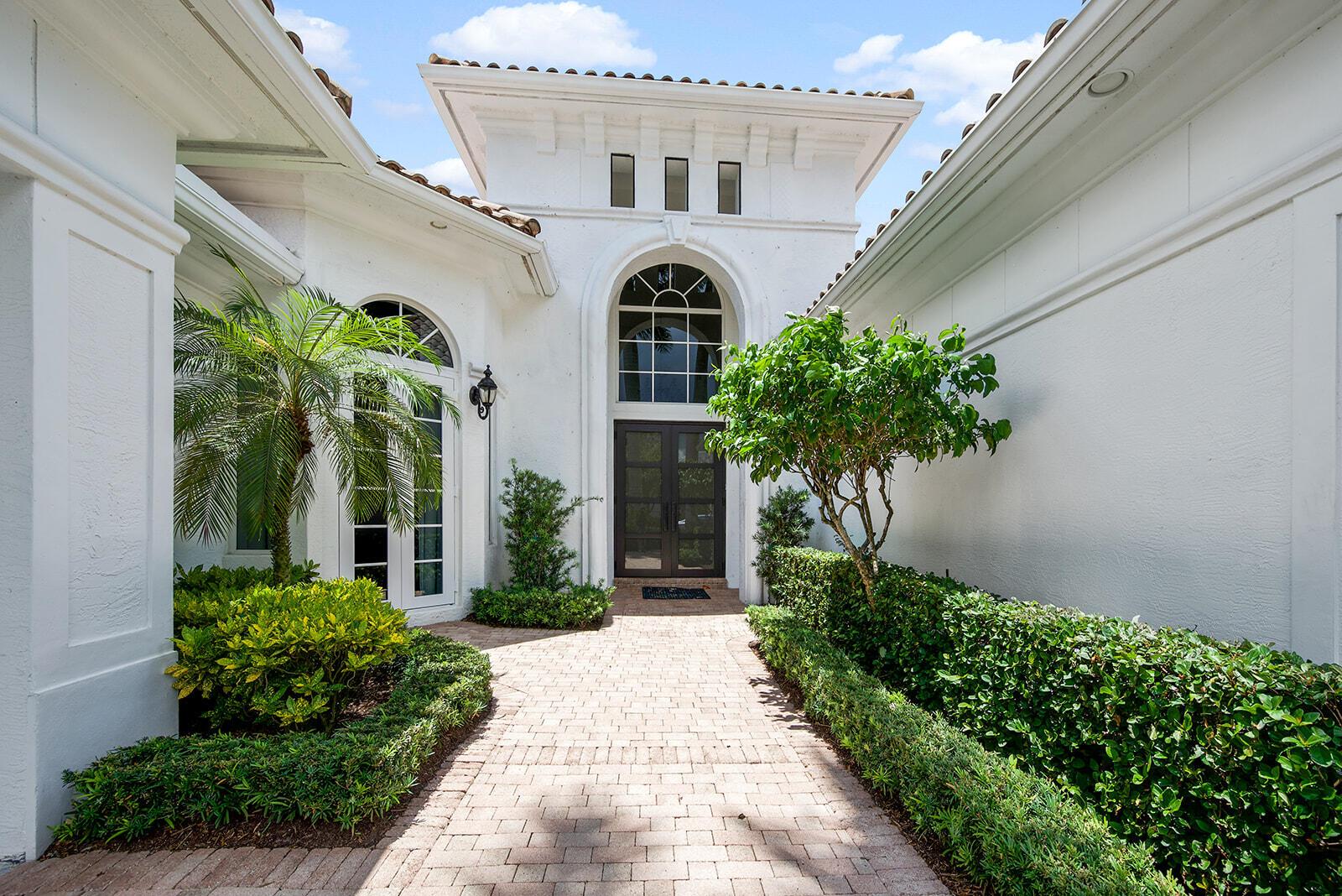 ***This home has a golf equity membership! ***Don't miss this one story, 3 bedroom, 4 bathroom home (plus large office), backing onto a sparkling lake and scenic golf course views. Features of the home include impact windows and doors, brand new master bathroom, 2 large master walk-in closets, full house generator, oversized kitchen, wet bar, water filtration system an open floor plan with high ceilings and a 2 1/2 car garage. This house is a beautie!