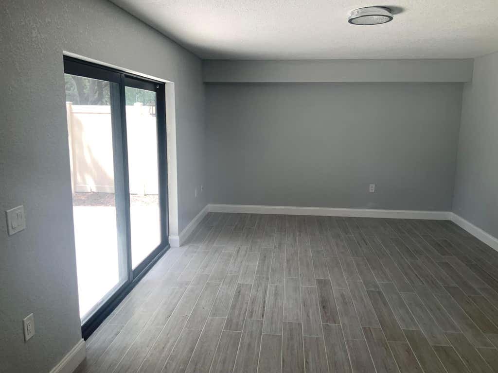 Photo of 6905 SE 69TH Way #6905, West Palm Beach, FL 33407 (MLS # B26051946)