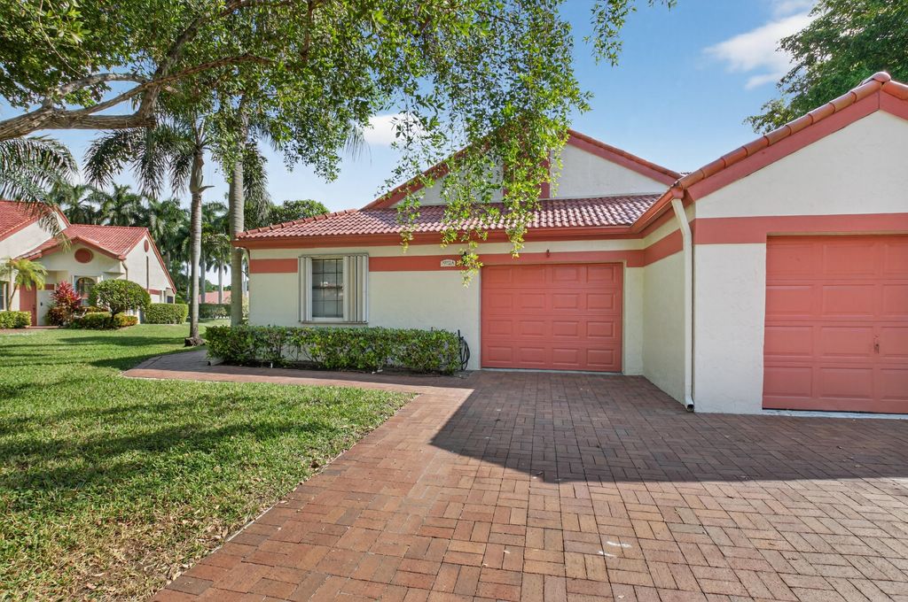 Photo of 7972 Lexington Club Boulevard #A, Delray Beach, FL 33446 (MLS # R11144302)