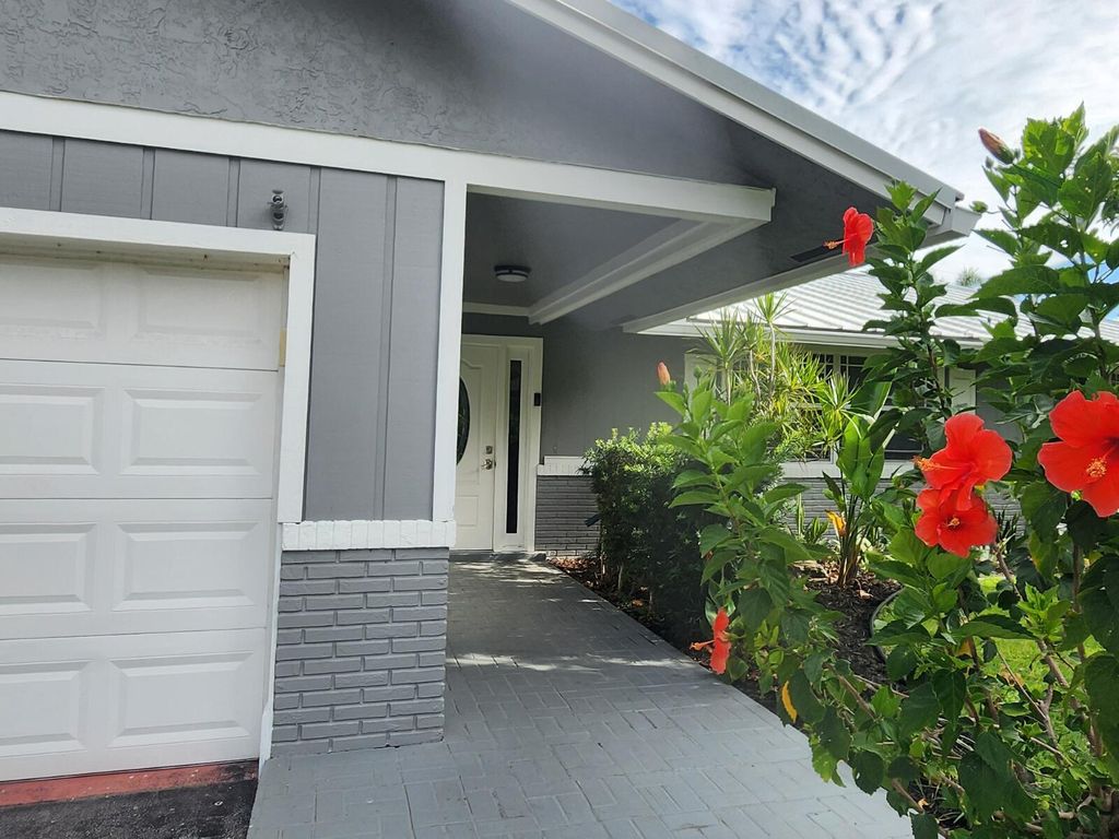 Photo of 696 Dotterel Road, Delray Beach, FL 33444 (MLS # R11081038)