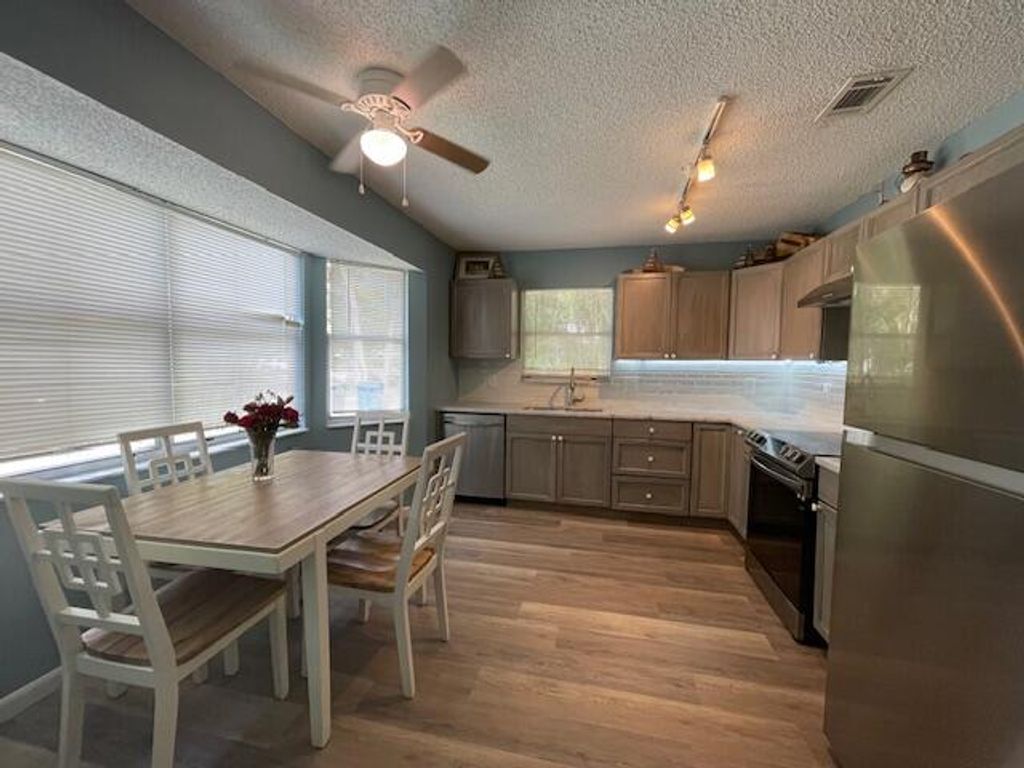 Photo of 420 Park Avenue, Lake Park, FL 33403 (MLS # R11064880)