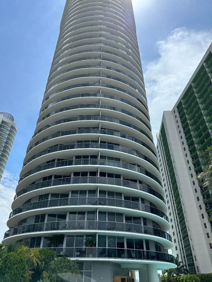 ARIA ION THE BAY UNIT FACING NE, PRIVATE ELEVATOR ENTRANCE TO THE UNIT, LARGE 2 BEDROOMS + DEN AND 3 BATHS, PORCELAINE FLOORS, BUILT IN CLOSETS, AMAZING AMENITIES, ONE PARKING SPACE ASSIGNED ON THE SAME FLOOR.