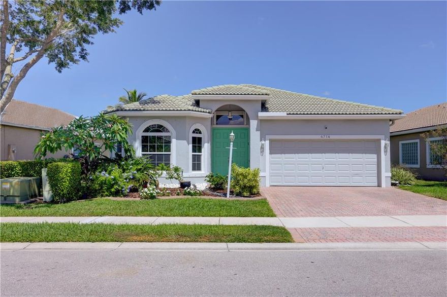 Welcome to your lakefront oasis! This beautiful 4/2.5 single family home is located in the gated community of Pelican Trail West and boasts a sparkling, heated pool w/baby gate, perfect for entertaining family and friends. Relax in the comfort of a well-maintained home with upgrades such as LED lighting, high impact windows in the living room & accordion shutters on the rest of the home, AC was replaced in 2015, water heater replaced in 2008, Real wood cabinets, granite counters and SS appliances. Separate laundry rm, freshly painted exterior, updated bathrooms, real hardwood floors, 11 years life left on the roof as per 4 point, and a brand new pool pump & pool heater replaced in 2022. HOA is low and includes lawn care. Easy access to highways, great schools and great restaurants!