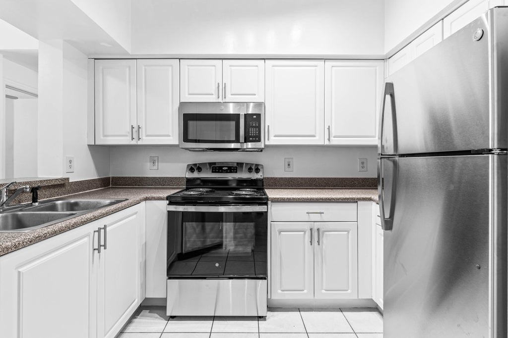 Photo of 1977 BRANDYWINE Road #305, West Palm Beach, FL 33409 (MLS # B26069575)