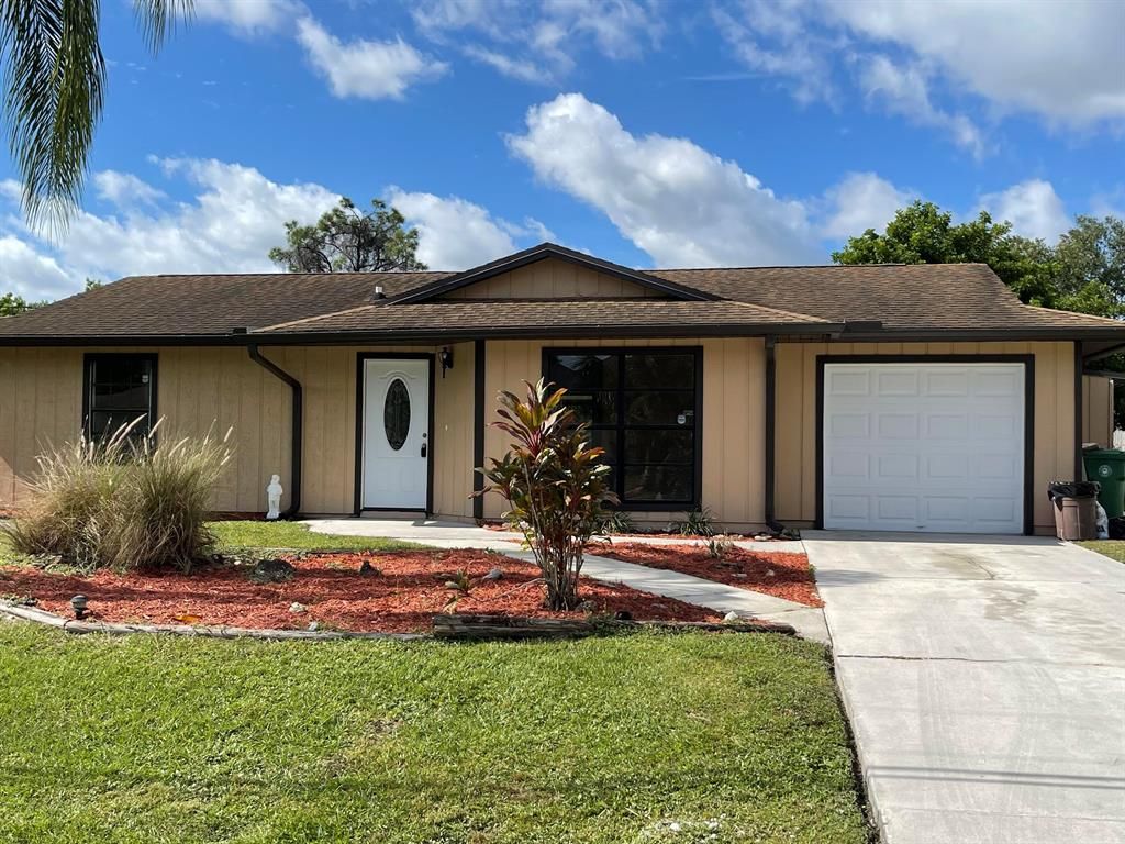 Photo of 1962 SW Idaho Lane, Port Saint Lucie, FL 34953 (MLS # R10754276)