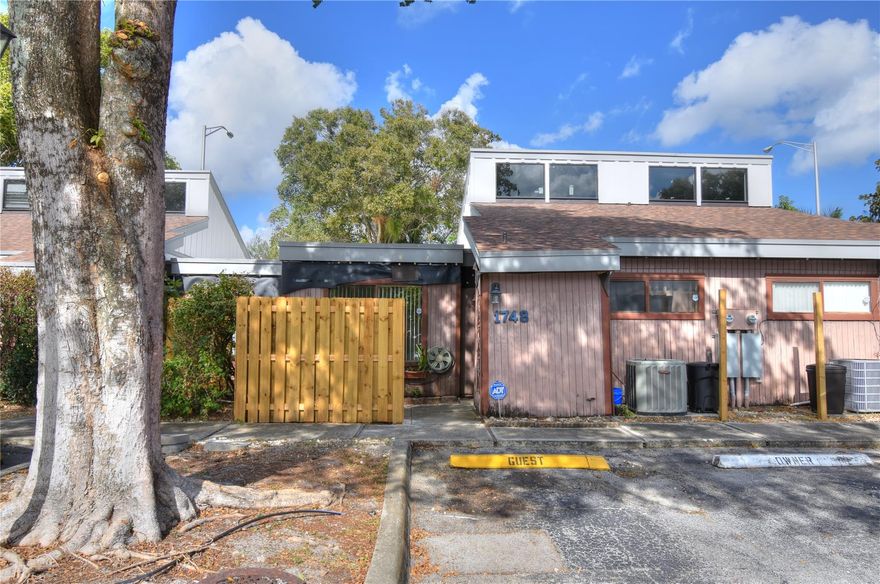 Omega Villas Condo unit located in Plantation.  Exterior renovations in process including newly installed roof.  Split bedroom floor plan with two full baths in the middle of two bedrooms.  Master dressing area, walk in closet plus extra closet.  Lots of storage.  Laundry area accessible from front patio.  Pantry in kitchen.  Skylight windows impact.  Back screened patio plus fence enclosed backyard space too.