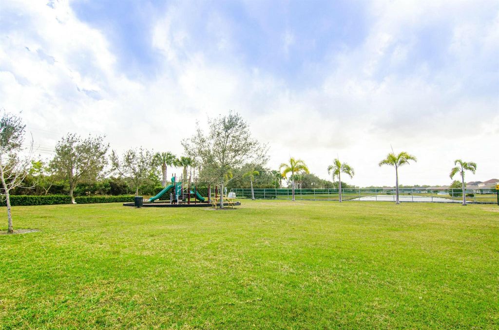 Photo of 5600 NW Pine Trail Circle, Port Saint Lucie, FL 34983 (MLS # R11077444)