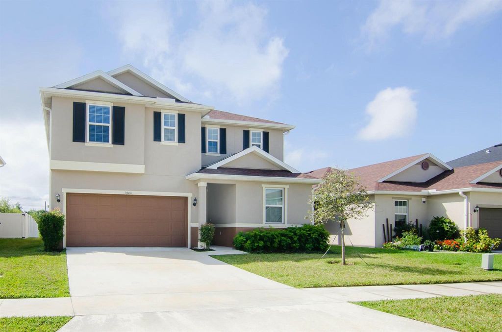 Photo of 5600 NW Pine Trail Circle, Port Saint Lucie, FL 34983 (MLS # R11077444)