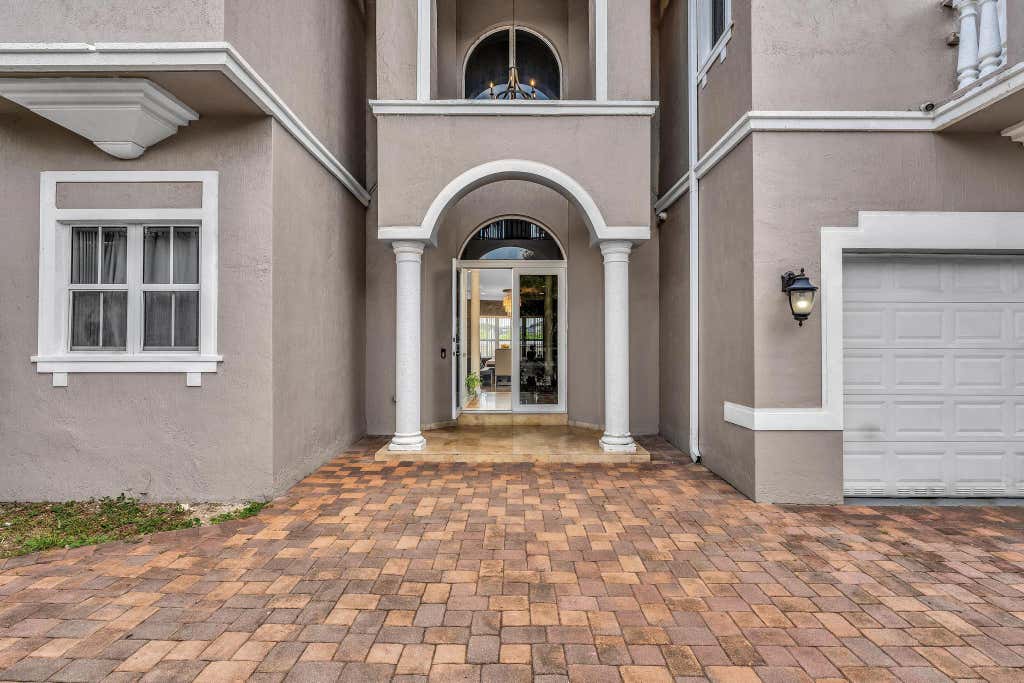 Photo of 3521 FOREST VIEW Circle, Dania Beach, FL 33312 (MLS # B26069172)