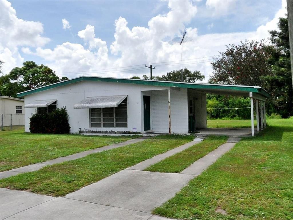 Photo of 300 SW Airoso Boulevard, Port Saint Lucie, FL 34983 (MLS # R10764194)