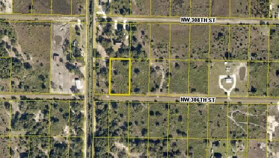 Beautiful piece of land located on the Kissimmee prairie, this 1.25 acres is just right for whatever your heart desires. About 45 minute drive to Lake O for the best bass fishing! If you are looking to get away from the city or want to build your weekend cabin, this is the spot for you.The adjoining property 15079 NW 306th Street, Okeechobee, FL 34972 MLS#: RX-10798584 is for sale as well, if you are looking for side by side properties this is a great opportunity!
