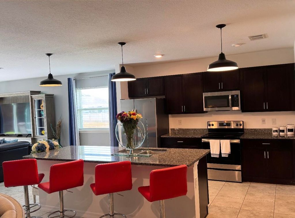 Photo of 4617 SW Scanavino Street, Port Saint Lucie, FL 34953 (MLS # R11109976)