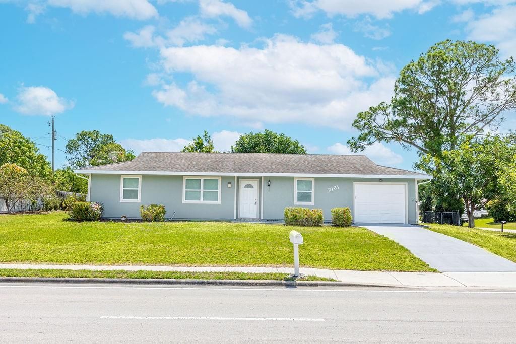 Photo of 2161 SE Airoso Boulevard, Port Saint Lucie, FL 34984 (MLS # F10438764)