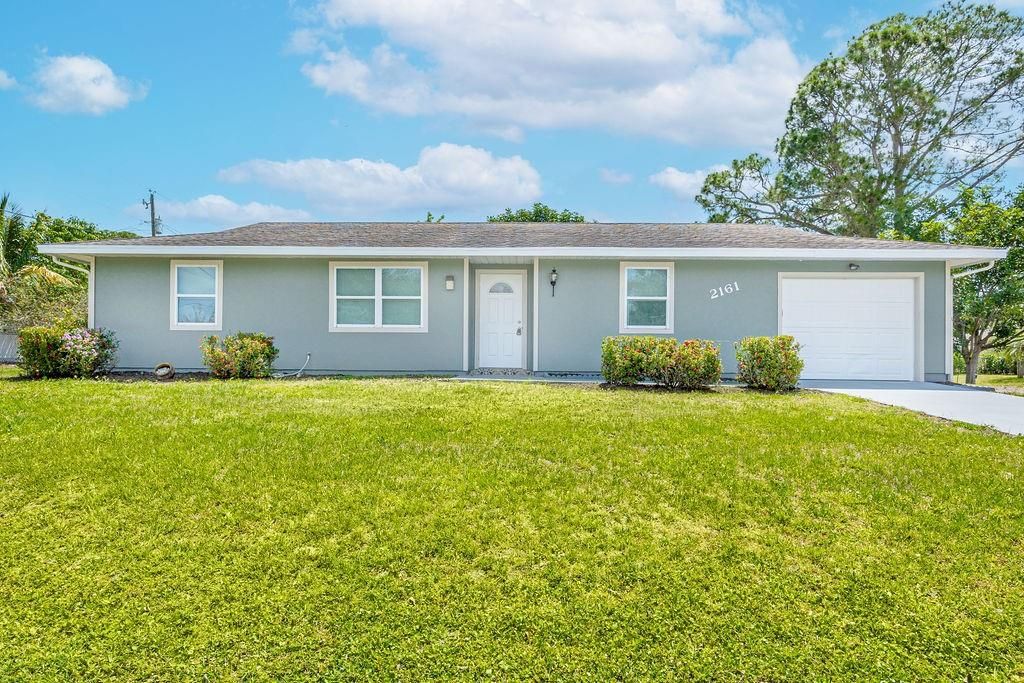 Photo of 2161 SE Airoso Boulevard, Port Saint Lucie, FL 34984 (MLS # F10438764)