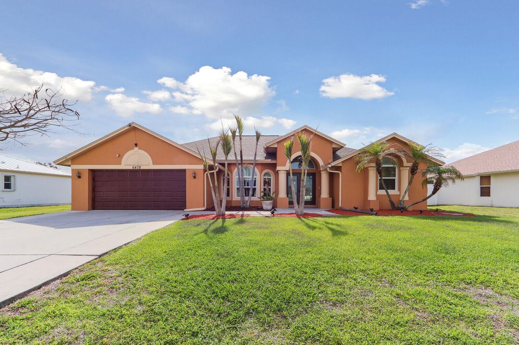 Photo of 6478 NW Volucia Drive, Port Saint Lucie, FL 34986 (MLS # B26022653)