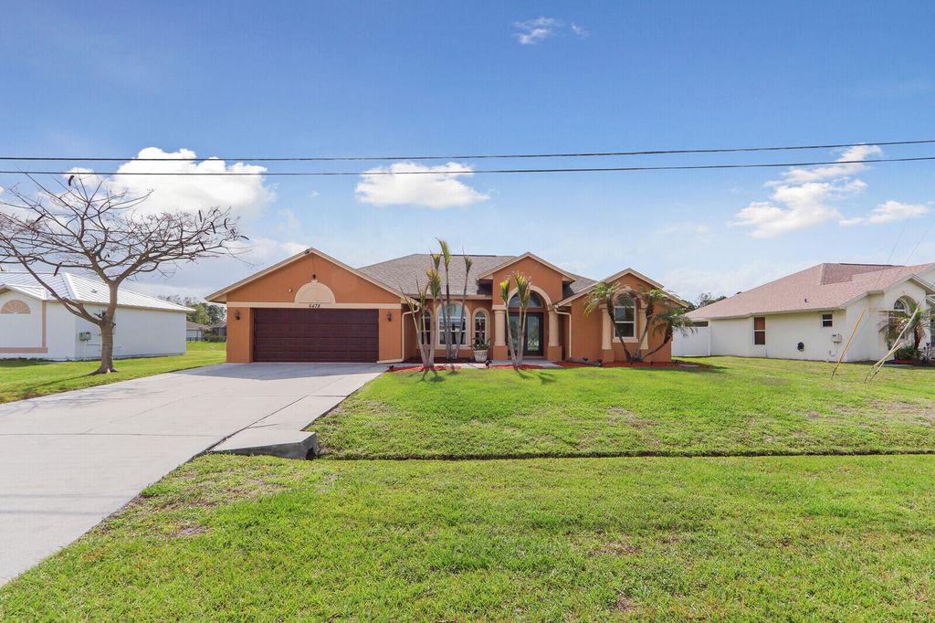 Photo of 6478 NW Volucia Drive, Port Saint Lucie, FL 34986 (MLS # B26022653)