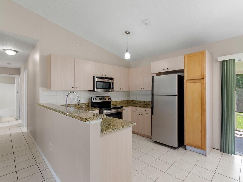 Photo of 2234 SW Chateau Terrace, Port Saint Lucie, FL 34953 (MLS # R10982806)
