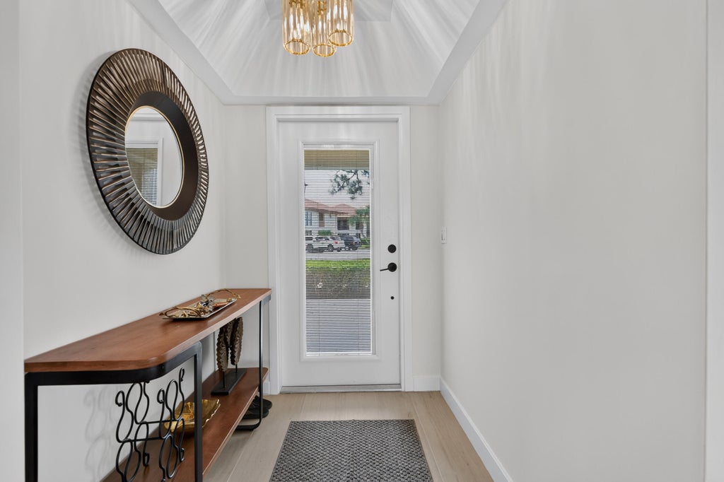 Photo of 302 BRACKENWOOD CIR, Palm Beach Gardens, FL 33418 (MLS # B26061904)