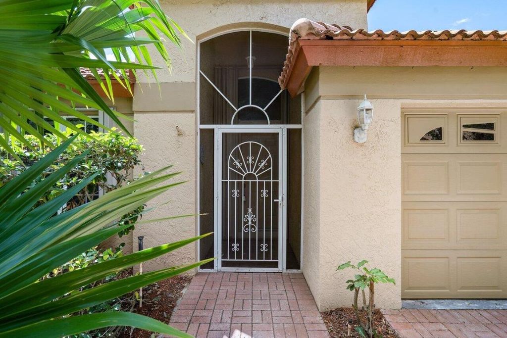 Photo of 5127 Elpine Way, Riviera Beach, FL 33418 (MLS # R10975005)