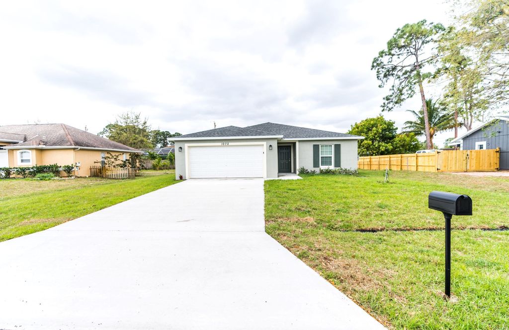 Photo of 1072 SW Sarto Lane, Port Saint Lucie, FL 34952 (MLS # R10781208)