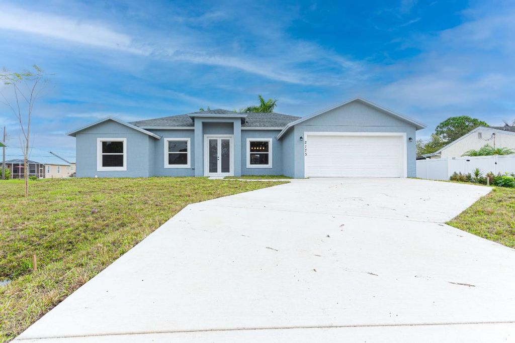 Photo of 2173 SW Trenton Lane, Port Saint Lucie, FL 34984 (MLS # R10949406)