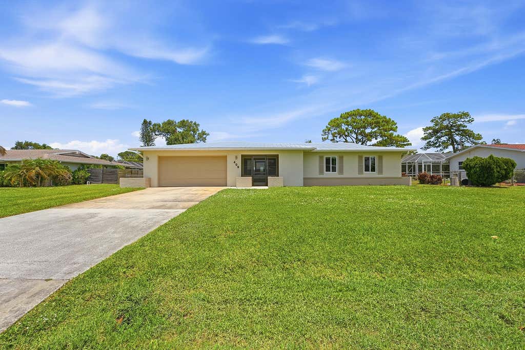 Photo of 409 SE Gasparilla Avenue, Port Saint Lucie, FL 34983 (MLS # B26051755)
