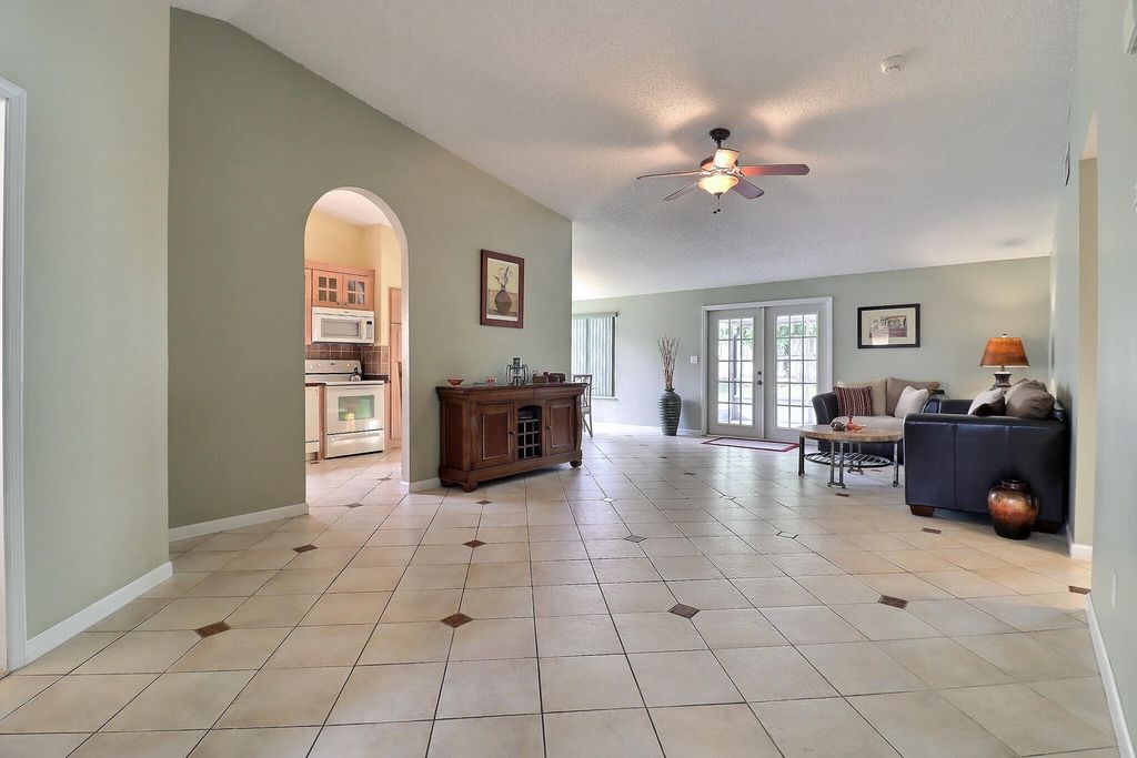 Photo of 130 Sherwood Drive, Royal Palm Beach, FL 33411 (MLS # R10941400)