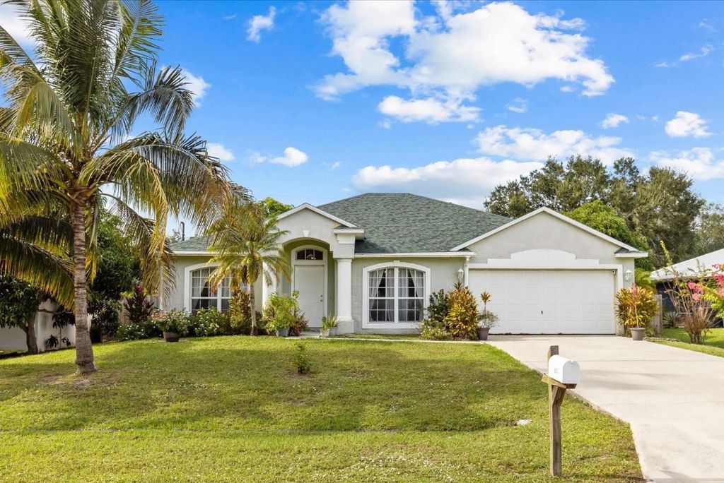 Photo of 2823 SE Pace Dr, Port Saint Lucie, FL 34984 (MLS # F10536434)