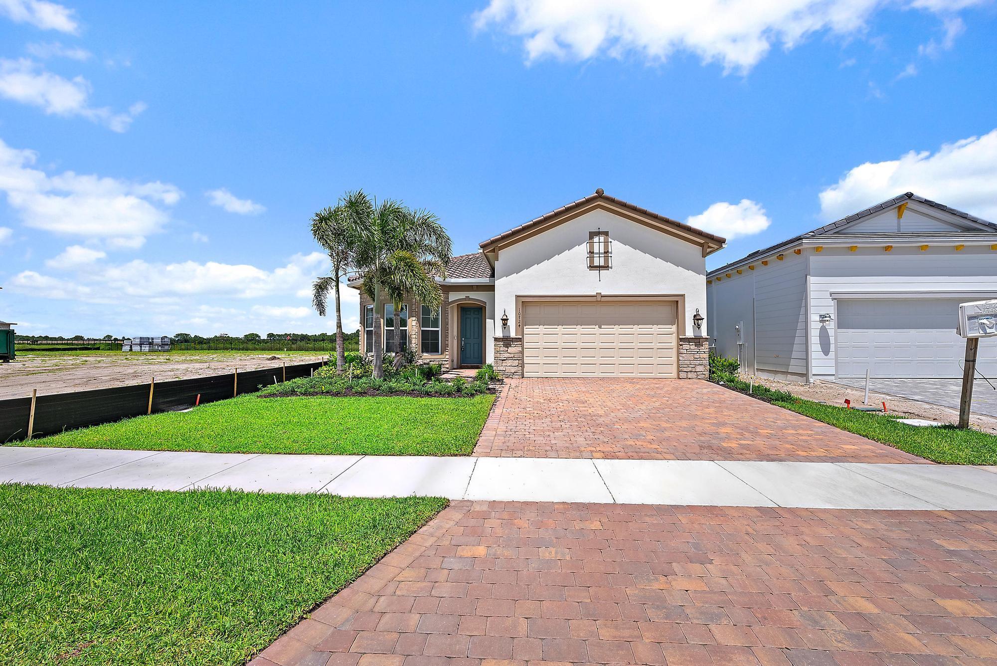 Beautiful, Modern & Brand NEW (never lived in) Mainstay model at Avondale in Avenir! This gorgeous home backing onto a PRESERVE features an open-concept home design with 3 spacious bedrooms, 2 bathrooms, and a flex room perfect for a home office or den. Enjoy the connected designer kitchen, cafe, gathering room, and covered lanai - making entertaining a breeze - or slip away to the private owner's suite complete with spa-like bathroom.
