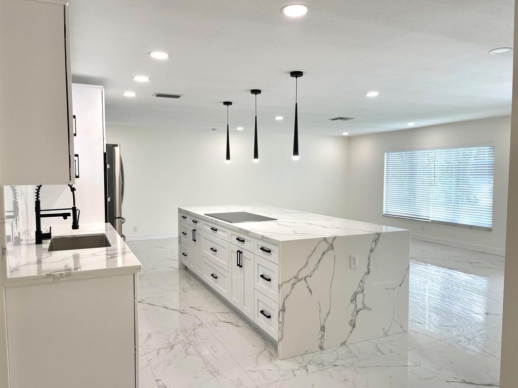 Photo of 1101 NW 5th Avenue, Boca Raton, FL 33432 (MLS # R11090545)