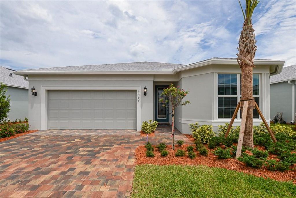 Photo of 12385 SW Myrtle Oak Dr, Port St Lucie, FL 34987 (MLS # F10378335)