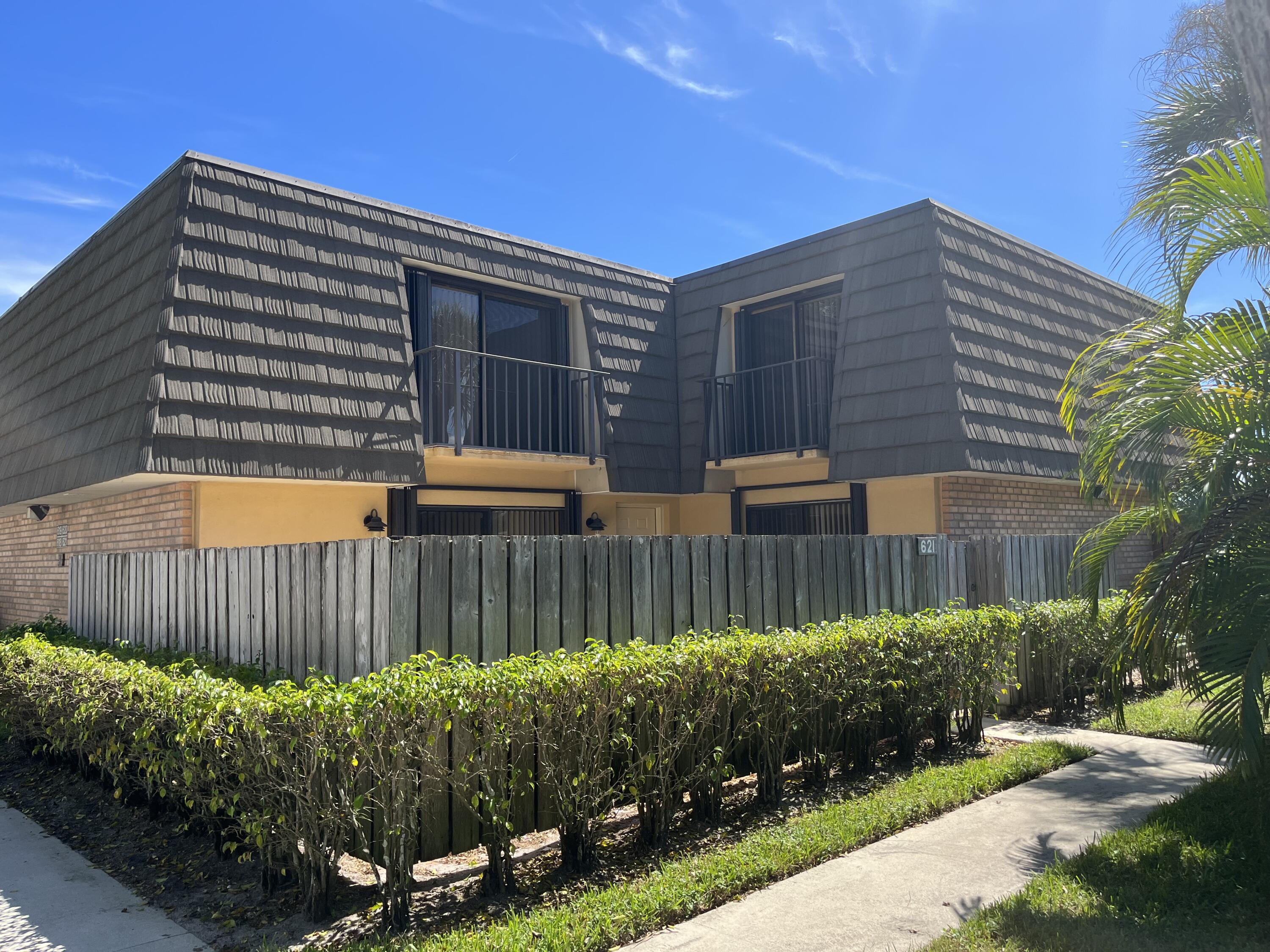 Spacious townhome with brand new tile & carpet throughout!! Large fenced in private patio. Accordion shutters complete! Don't miss this chance to make this centrally located townhome your residence!