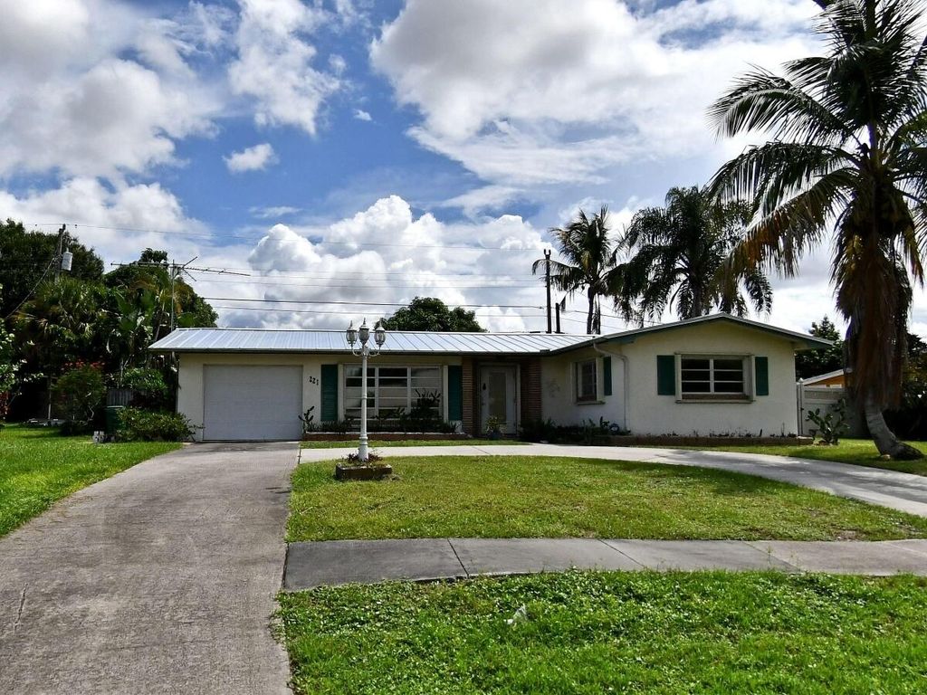 Photo of 221 Riomar Drive, Port Saint Lucie, FL 34952 (MLS # R10859475)