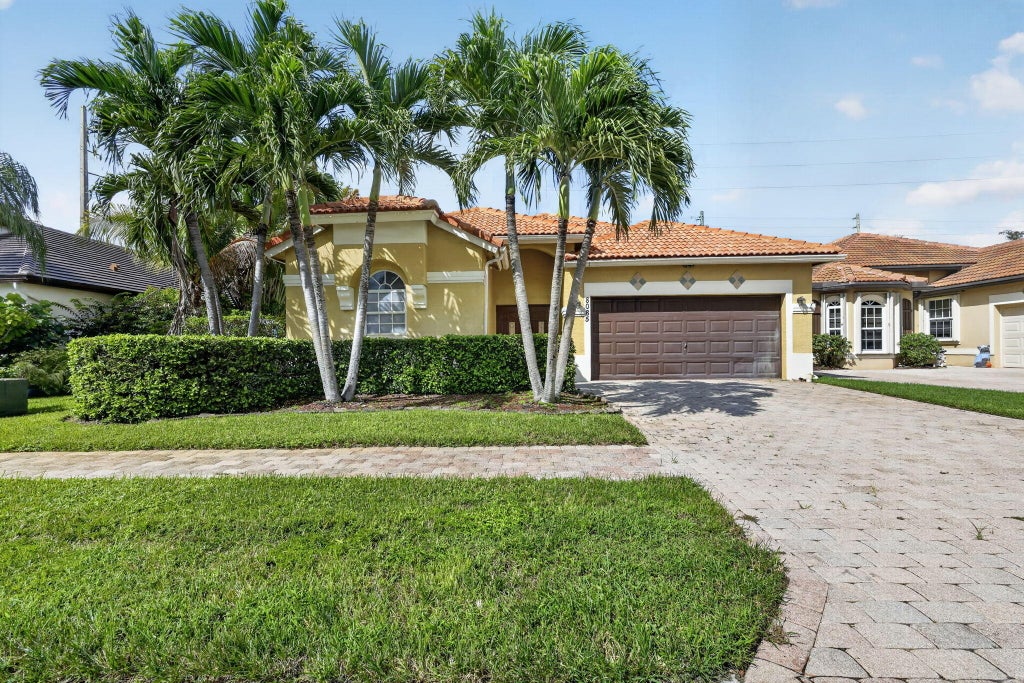Photo of 8085 SAW PALMETTO Lane, Boynton Beach, FL 33436 (MLS # B26086201)