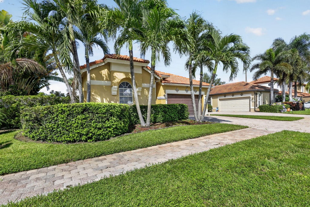 Photo of 8085 SAW PALMETTO Lane, Boynton Beach, FL 33436 (MLS # B26086201)