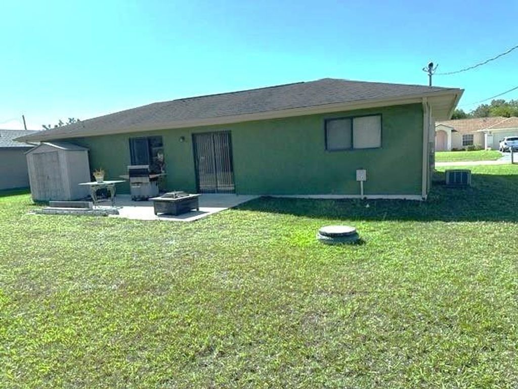 Photo of 2565 SE Dogwood Avenue, Port Saint Lucie, FL 34952 (MLS # F10447699)