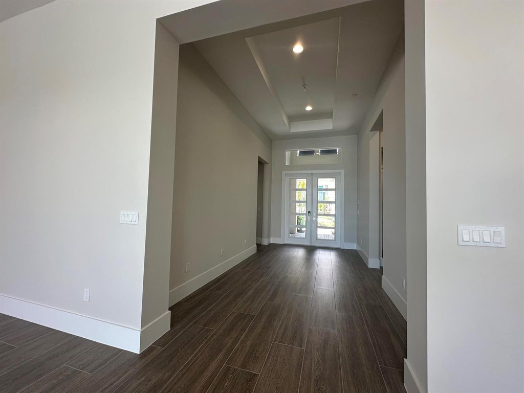 Photo of 9105 Coral Isles Circle #{Lot 87}, Palm Beach Gardens, FL 33412 (MLS # R10997105)