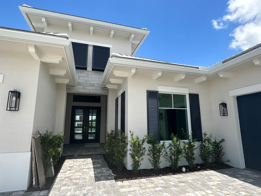 Photo of 9105 Coral Isles Circle #{Lot 87}, Palm Beach Gardens, FL 33412 (MLS # R10997105)