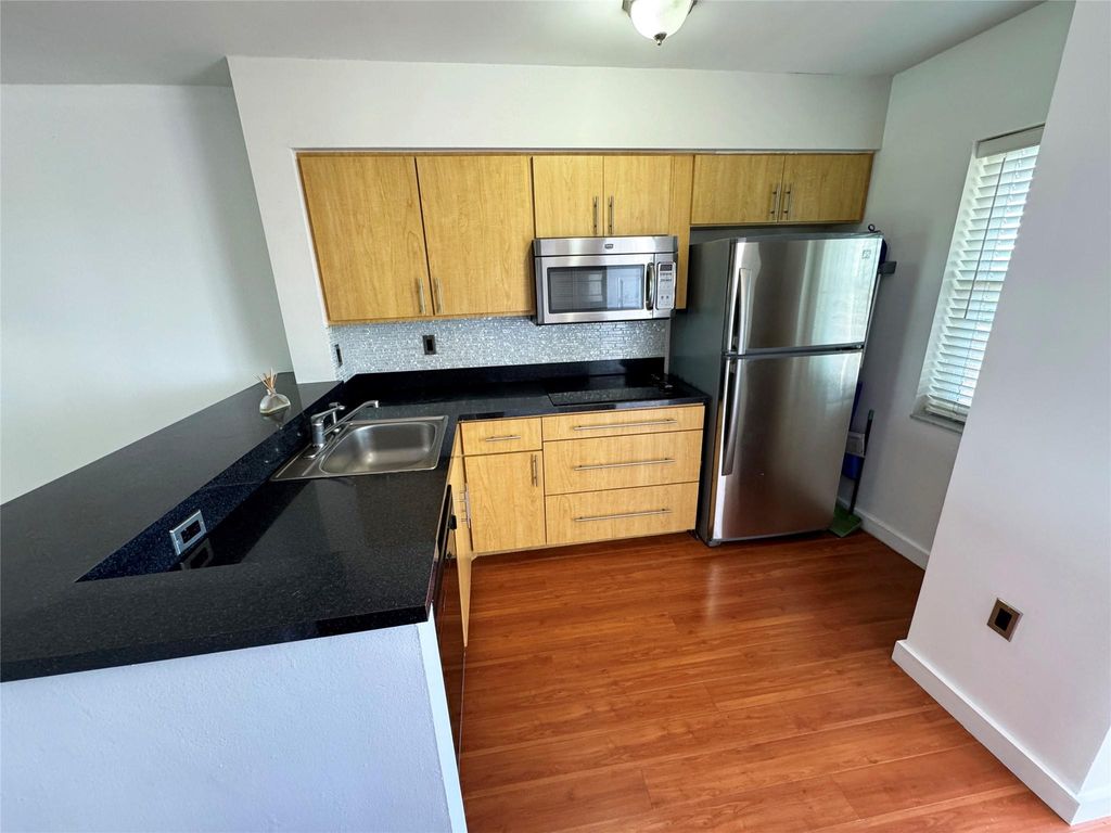 Photo of 2104 S Cypress Bend Drive #502, Pompano Beach, FL 33069 (MLS # F10451613)