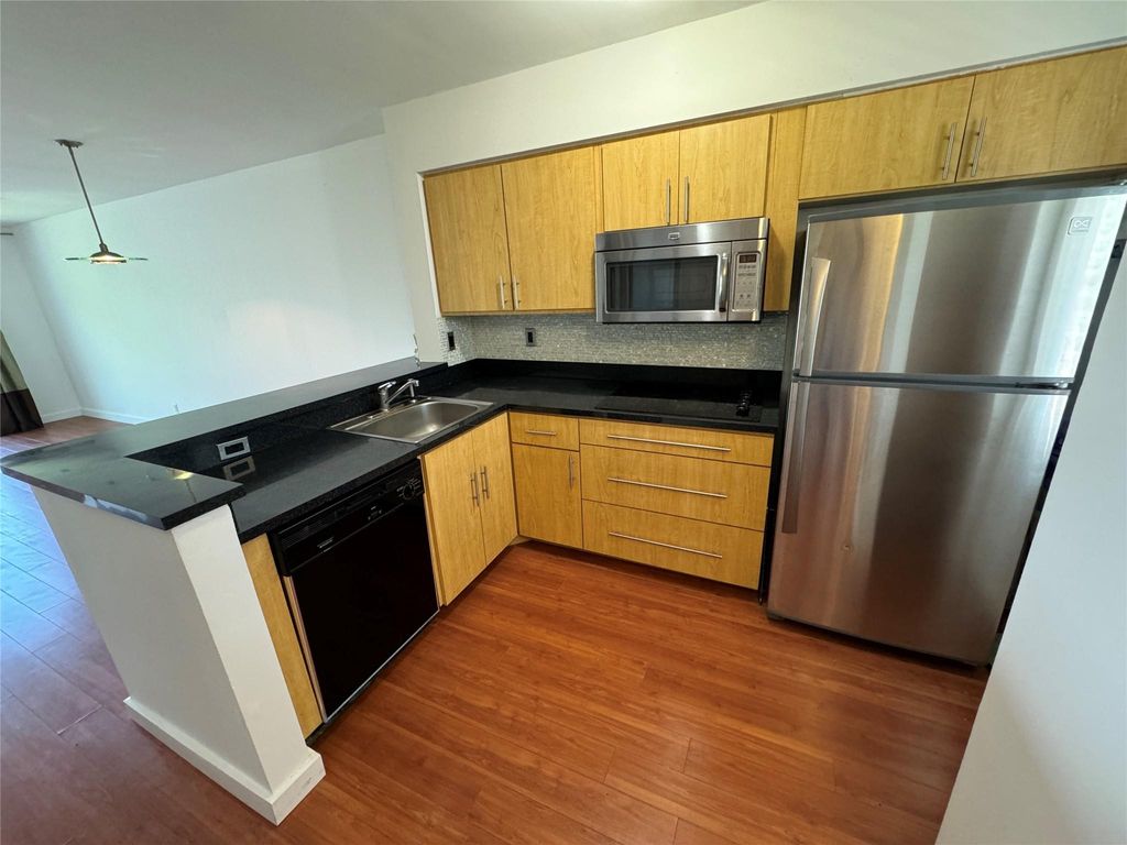 Photo of 2104 S Cypress Bend Drive #502, Pompano Beach, FL 33069 (MLS # F10451613)